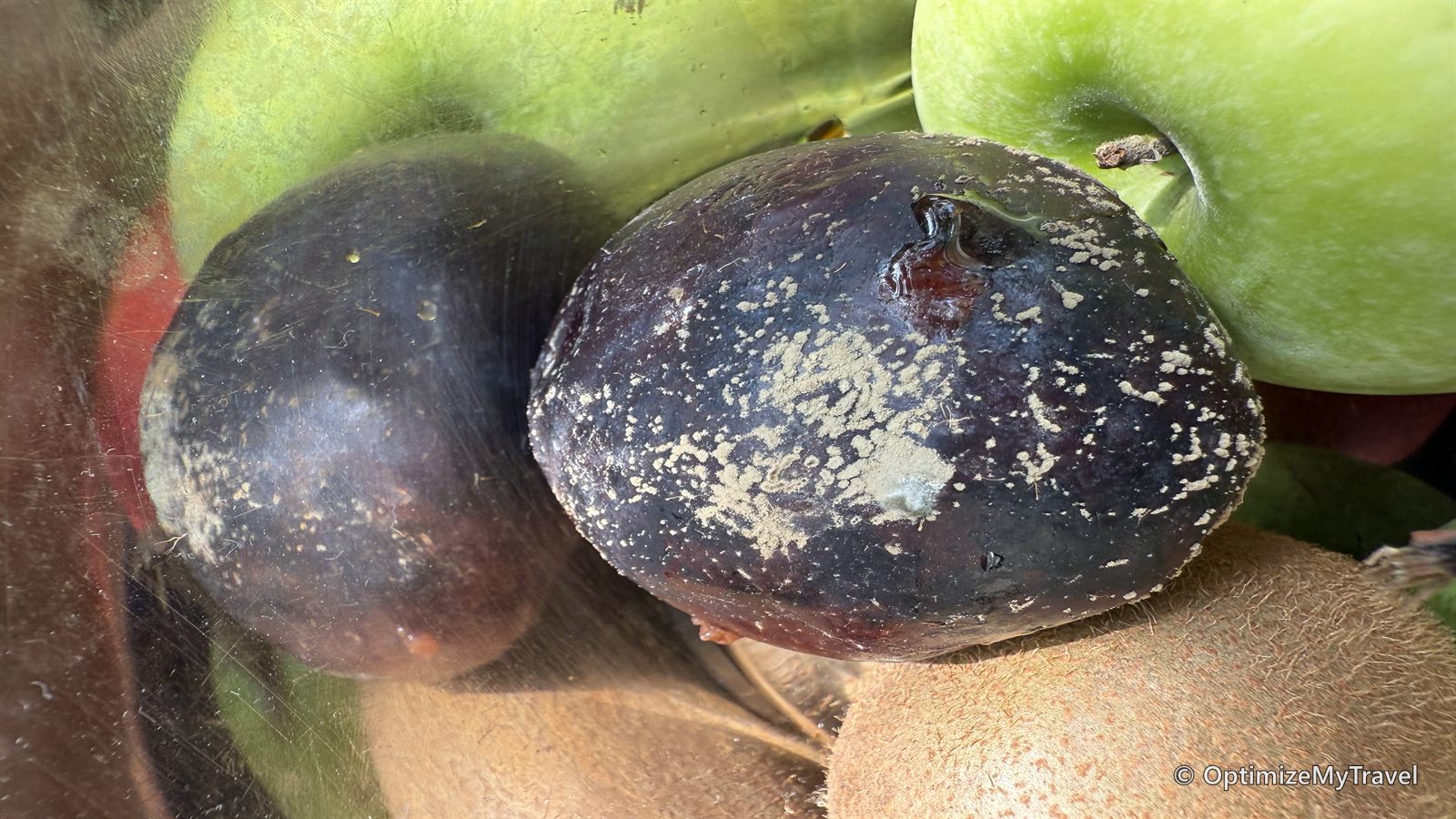 Close view of visibly spoiled fruit from the hotel welcome tray