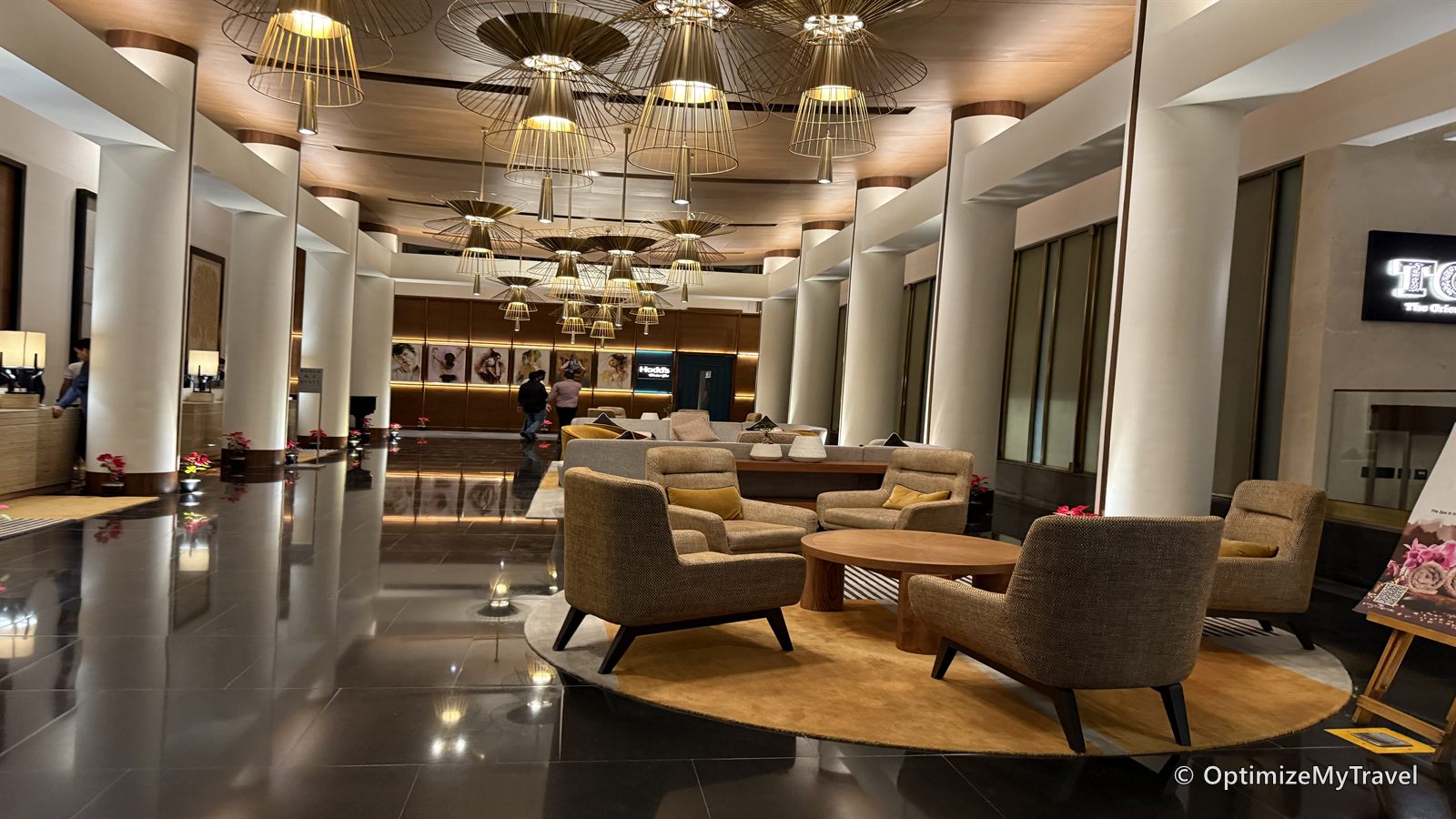 Hyatt Hyderabad Gachibowli lobby with lounge seating beneath suspended lights