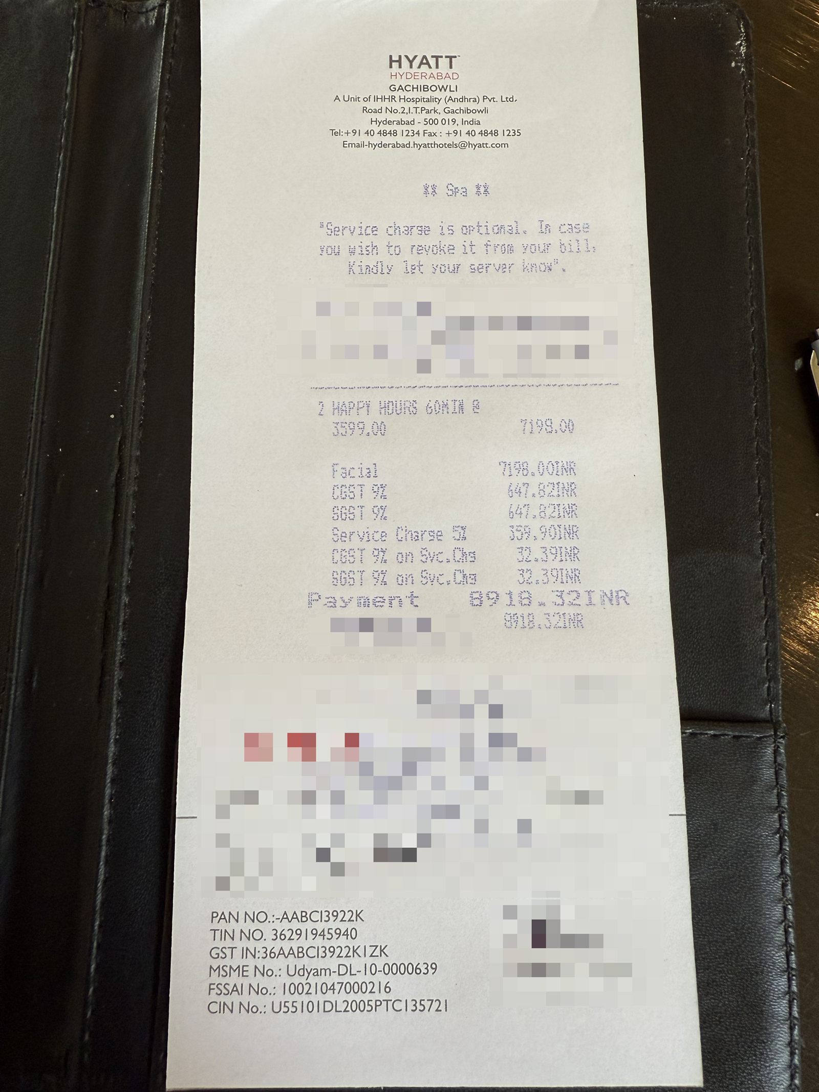 Hyatt Hyderabad Gachibowli spa bill showing a happy-hour offer and taxes